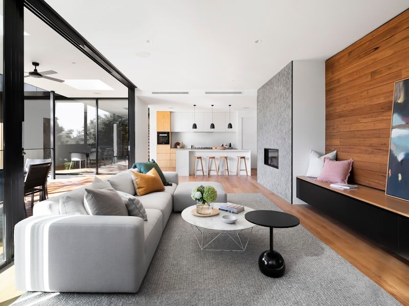 Modern open-plan Vancouver living space with kitchen and pendant lighting